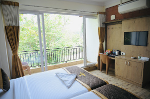 Side view of Hotel Parijatha Inn property near Nethravathi Bridge, Dharmasthala
